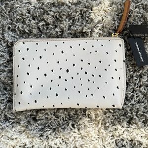 Clutch handbagFrom Banana Republic. The neutral color goes with everything.